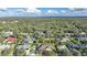 Aerial view of single-Gathering home in a residential neighborhood at 1064 Harbour Way Pl, Punta Gorda, FL 33983