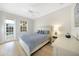 Serene bedroom with sliding doors to the backyard and pool access at 1064 Harbour Way Pl, Punta Gorda, FL 33983