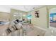 Bright living room with sliding glass doors leading to the pool area at 1064 Harbour Way Pl, Punta Gorda, FL 33983