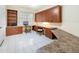 Well-equipped home office with wood cabinetry and ample workspace at 1064 Harbour Way Pl, Punta Gorda, FL 33983