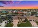 Luxury waterfront home with sunset view, showcasing neighborhood and canal at 1422 Kittiwake Dr, Punta Gorda, FL 33950