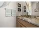 Bathroom with granite vanity and decorative accents at 1422 Kittiwake Dr, Punta Gorda, FL 33950