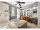 Elegant Primary bathroom, featuring a soaking tub and walk-in shower at 1422 Kittiwake Dr, Punta Gorda, FL 33950