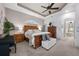 Bright Primary bedroom with ensuite bathroom access and ample space at 1422 Kittiwake Dr, Punta Gorda, FL 33950