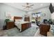 Spacious bedroom with water views, built-in desk, and ample closet space at 1422 Kittiwake Dr, Punta Gorda, FL 33950