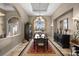 Elegant dining room features a large table, chandelier, and built-in hutch at 1422 Kittiwake Dr, Punta Gorda, FL 33950