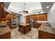 Spacious kitchen featuring granite countertops and stainless steel appliances at 1422 Kittiwake Dr, Punta Gorda, FL 33950