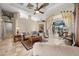 Bright and airy living room with high ceilings and access to the pool area at 1422 Kittiwake Dr, Punta Gorda, FL 33950