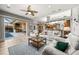 Spacious living room with sliding doors opening to the pool area at 1422 Kittiwake Dr, Punta Gorda, FL 33950