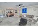 Open living and dining area with a comfortable seating arrangement and view of kitchen at 150 Harborside Ave # 313, Punta Gorda, FL 33950