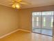 Bedroom with sliding glass door to the sunroom at 1626 Sharpe St, Port Charlotte, FL 33952