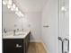 Modern bathroom with double vanity, and updated fixtures at 18854 Ackerman Ave, Port Charlotte, FL 33948
