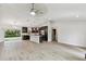 Open floor plan with kitchen, living, and dining areas at 18854 Ackerman Ave, Port Charlotte, FL 33948