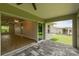 Screened patio with access to living room and backyard at 18854 Ackerman Ave, Port Charlotte, FL 33948