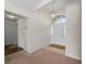 Welcoming entryway with a vaulted ceiling, a chandelier, and tiled flooring at 1946 Cove Pointe Dr, Venice, FL 34293