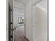 Hallway leading to bedroom and bathroom at 1946 Cove Pointe Dr, Venice, FL 34293
