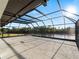 Spacious screened-in patio with a waterfront view at 1946 Cove Pointe Dr, Venice, FL 34293