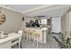 Modern kitchen with black appliances and breakfast bar at 25225 Rampart Blvd # 1901, Punta Gorda, FL 33983