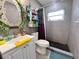 Bathroom with a toilet, sink, and shower at 27240 Tribune Blvd, Punta Gorda, FL 33955