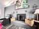 Living room fireplace with gray brick surround at 27240 Tribune Blvd, Punta Gorda, FL 33955