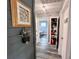 Clean hallway with access to other rooms and storage at 27240 Tribune Blvd, Punta Gorda, FL 33955