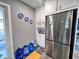Modern kitchen with white cabinets, granite countertops, and stainless steel appliances at 27240 Tribune Blvd, Punta Gorda, FL 33955