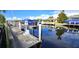 Private boat dock with lift, perfect for enjoying waterfront living at 2842 Sancho Panza Ct, Punta Gorda, FL 33950