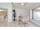 Bright dining room with wood table and white chairs at 299 Barcelona St, Punta Gorda, FL 33983