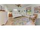 Spacious bedroom with a ceiling fan and large windows at 3340 Wood Thrush Dr # 323, Punta Gorda, FL 33950