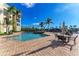 Inviting community pool with surrounding patio at 3340 Wood Thrush Dr # 323, Punta Gorda, FL 33950
