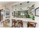 Modern kitchen with breakfast bar and white cabinets at 3340 Wood Thrush Dr # 323, Punta Gorda, FL 33950