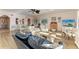 Relaxing living room with leather sofa and water views at 3340 Wood Thrush Dr # 323, Punta Gorda, FL 33950