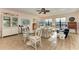 Spacious living room with hardwood floors and large windows at 3340 Wood Thrush Dr # 323, Punta Gorda, FL 33950