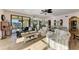 Open concept living room with access to balcony at 3340 Wood Thrush Dr # 323, Punta Gorda, FL 33950