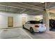 Secure parking garage with designated parking spaces at 3340 Wood Thrush Dr # 323, Punta Gorda, FL 33950