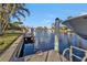 Private dock with boat lift, offering convenient water access at 3730 Whippoorwill Blvd, Punta Gorda, FL 33950