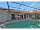 Relaxing pool and lanai with canal views at 3730 Whippoorwill Blvd, Punta Gorda, FL 33950