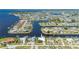 Waterfront home offering scenic views, private dock, and gorgeous tropical landscaping at 4431 Gardner Dr, Port Charlotte, FL 33952