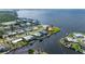 Waterfront home boasting scenic views, private boat dock, and lush landscaping at 4431 Gardner Dr, Port Charlotte, FL 33952