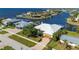 Aerial view of a charming single-Gathering home in a waterfront community with quick access to the Gulf and nearby attractions at 4431 Gardner Dr, Port Charlotte, FL 33952