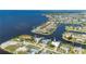 Lovely waterfront home with private dock, manicured lawn, and amazing scenic views at 4431 Gardner Dr, Port Charlotte, FL 33952