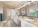 Bathroom with double vanity and garden tub at 4431 Gardner Dr, Port Charlotte, FL 33952