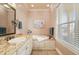 Bathroom with garden tub at 4431 Gardner Dr, Port Charlotte, FL 33952