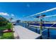 Boat dock featuring boat lift, boardwalk, and waterfront access to the Gulf at 4431 Gardner Dr, Port Charlotte, FL 33952