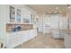 Kitchen with white cabinetry, granite countertops, and stainless steel appliances at 4431 Gardner Dr, Port Charlotte, FL 33952