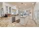 Beautiful kitchen featuring custom cabinets, granite countertops, and stainless steel appliances at 4431 Gardner Dr, Port Charlotte, FL 33952