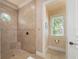Walk-in shower and toilet in bathroom at 4431 Gardner Dr, Port Charlotte, FL 33952