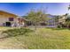 Spacious backyard with a screened pool and patio at 69 Sabal Dr, Punta Gorda, FL 33950