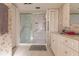 Updated bathroom with walk-in shower and vanity at 69 Sabal Dr, Punta Gorda, FL 33950