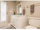 Bathroom with white vanity, large mirror, and walk-in shower at 69 Sabal Dr, Punta Gorda, FL 33950